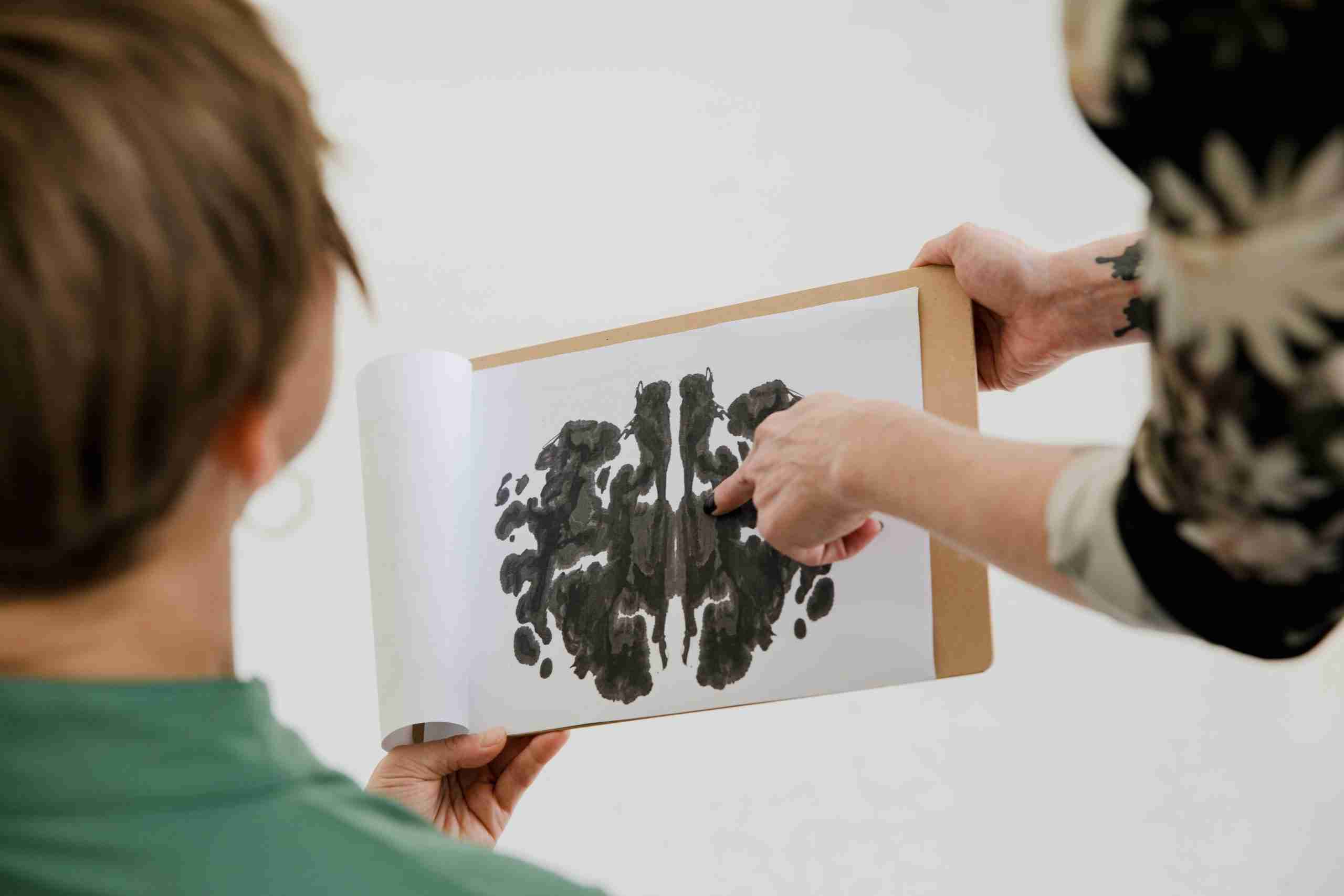 Psychologist showing a chart to a client