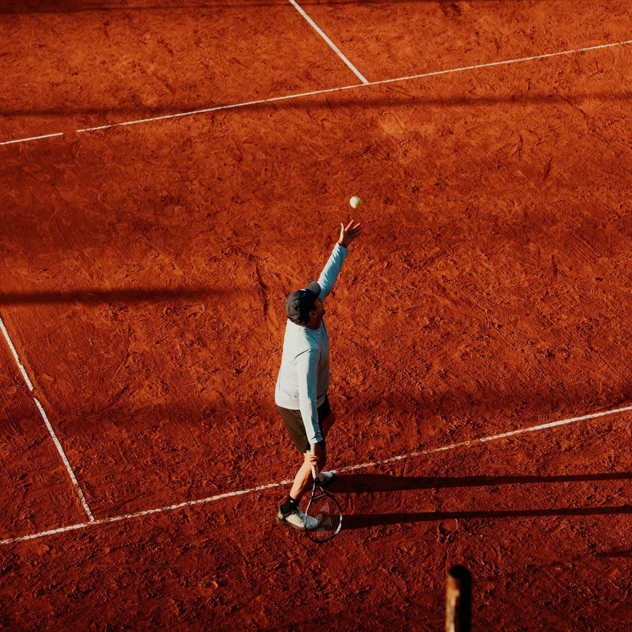 Tennis player serving